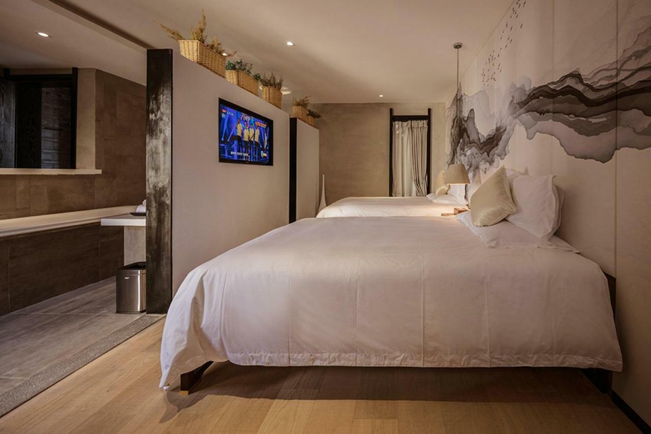 Lijiangl Hotel Liman Shenmiji Inn ليجيانغ المظهر الخارجي الصورة